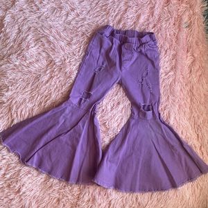 Girls bell bottom ripped jeans